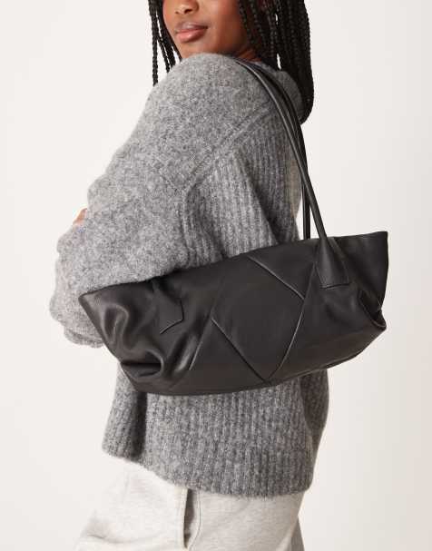 ASOS DESIGN – Längliche Lederhandtasche in Schwarz mit Webmuster - view 1