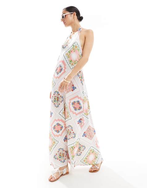 ASOS DESIGN – Lapptäcksmönstrad, a-linjeformad midiklänning med halterneck och knutdetalj - view 1