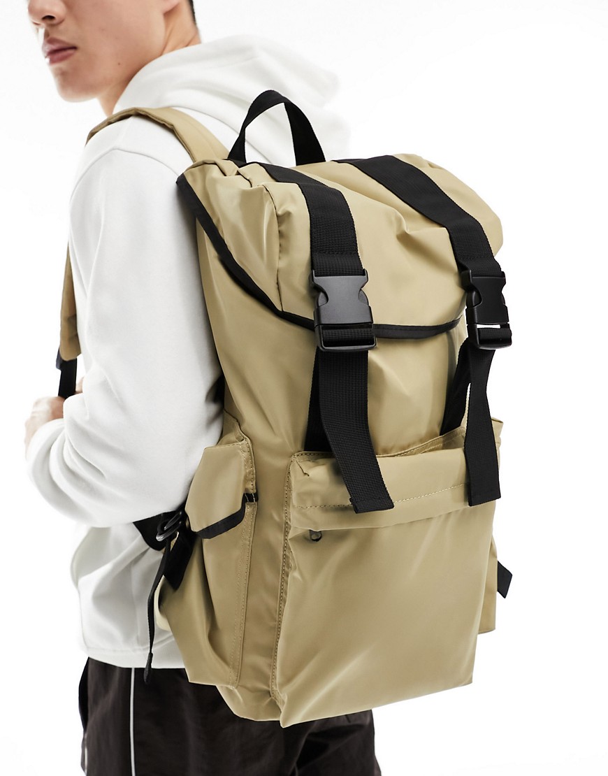Shop Asos Design Large Backpack Bag With Cargo Pockets And Black Trim In Stone-neutral