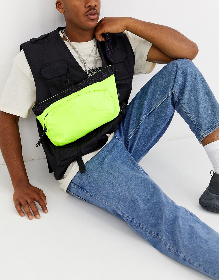 ASOS DESIGN large cross body bum bag in neon yellow with slogan strap