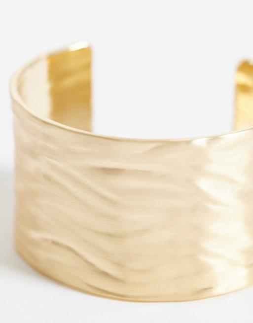 ASOS DESIGN large cuff bracelet with textured design in brushed gold tone, 2 of 3