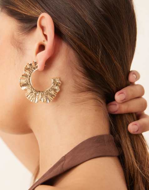 ASOS DESIGN large hoop earrings with hammered floral shape in gold tone - view 1