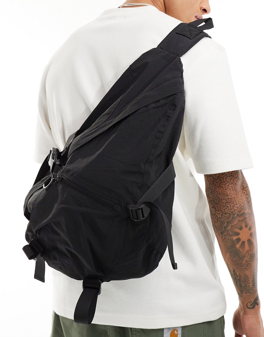 ASOS DESIGN large sling backpack bag in black