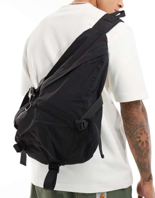 Oversized sling backpack best sale