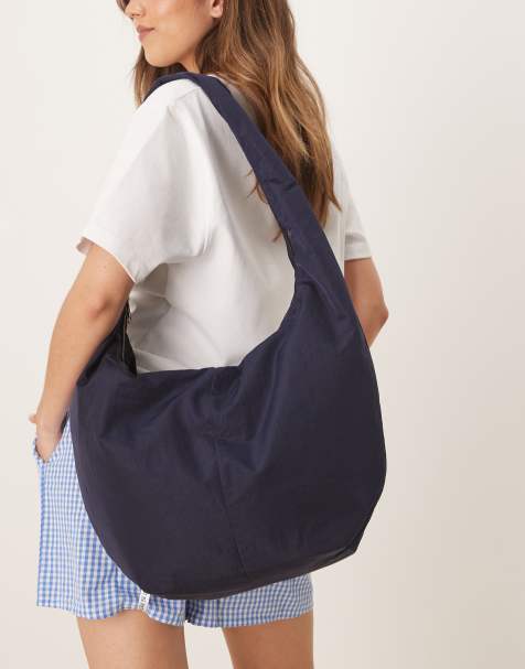 ASOS DESIGN large slouchy sling tote bag in navy - view 1