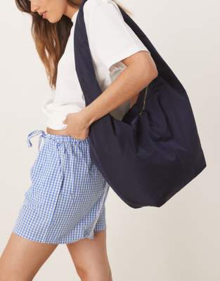 ASOS DESIGN large slouchy sling tote bag in navy