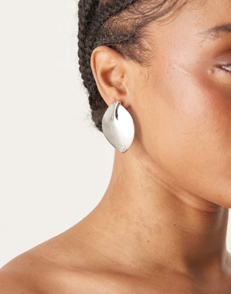 ASOS DESIGN large stud earrings in leaf shape in silver tone - view 1
