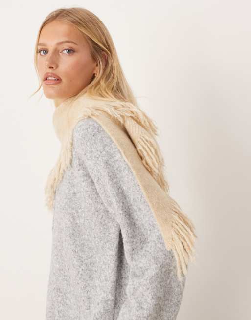 ASOS DESIGN large triangle scarf with tassel fringe in cream, 2 of 3