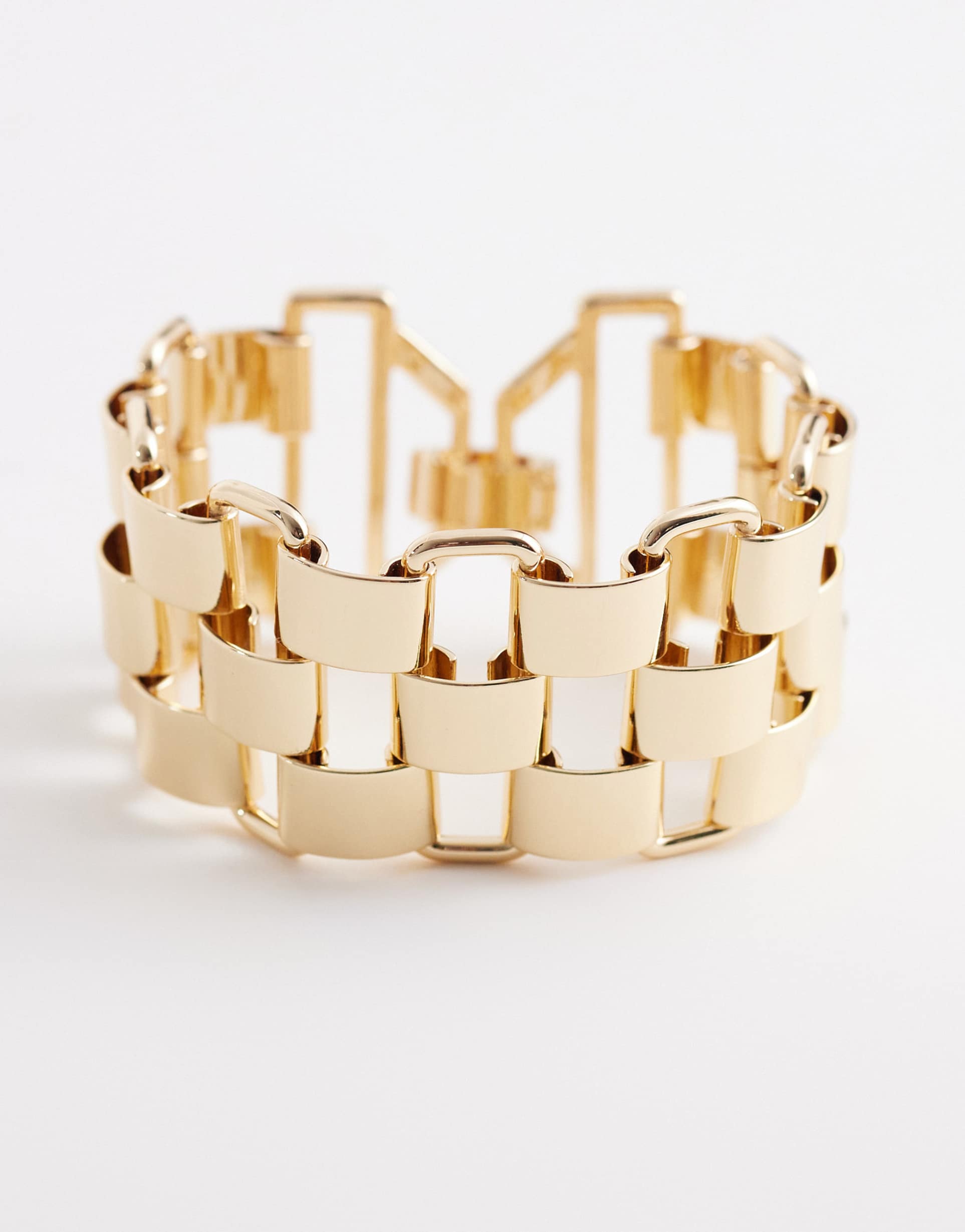 asos design large watch-strap style bracelet in gold tone