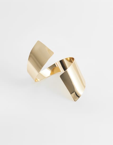ASOS DESIGN large wrap-around cuff bangle in gold tone - view 1
