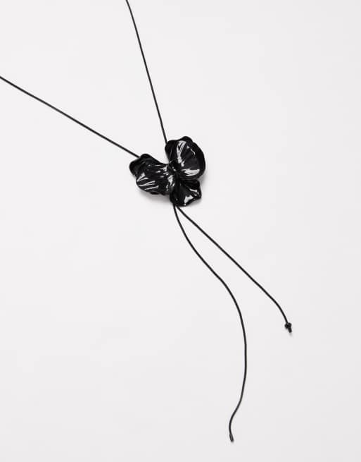 ASOS DESIGN lariat necklace with black chain and black flower detail, 2 of 3
