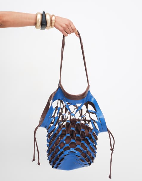 ASOS DESIGN laser cut slouchy tote bag in brown - view 1