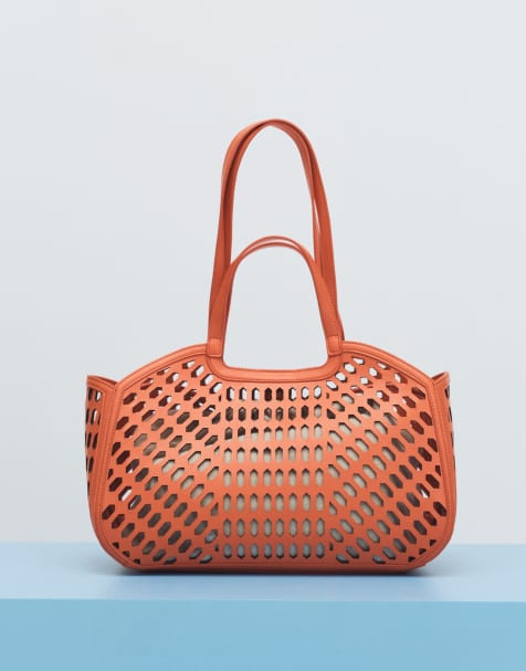 ASOS DESIGN - Lasergesneden tote tas in oranje - view 1