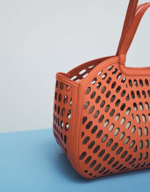 ASOS DESIGN - Lasergesneden tote tas in oranje, 2 van 7