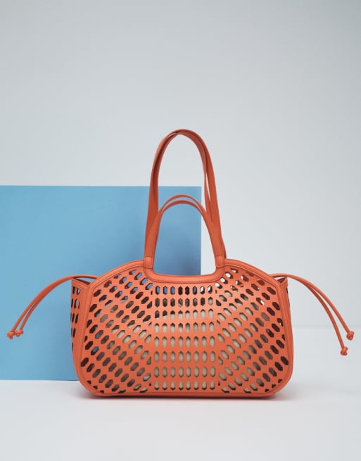 ASOS DESIGN - Lasergesneden tote tas in oranje, 4 van 7