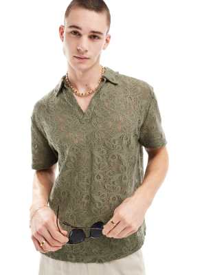 ASOS DESIGN – Lässiges Polohemd in Khaki mit Häkelmuster