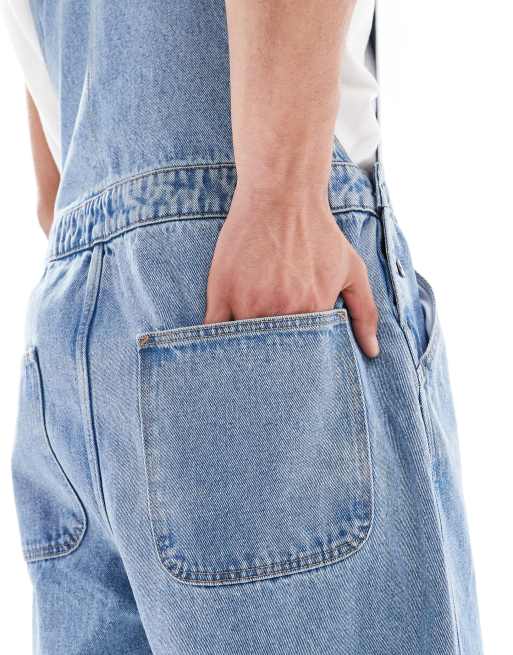 ASOS DESIGN – Latzhose aus Denim in mittelblauer Waschung mit Oversize-Schnitt, 3 von 4