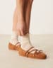 ASOS DESIGN mid rise cut and sew micro shorts in beige - part of a set