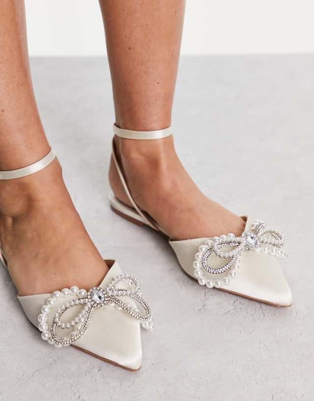 ASOS DESIGN Lavish pointed flats with faux pearl bow trim in ivory