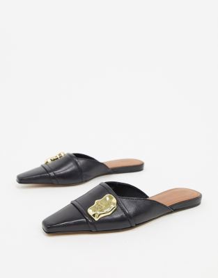 black embellished mules