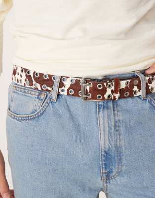 ASOS DESIGN leather cow studded rollerbuckle belt in brown