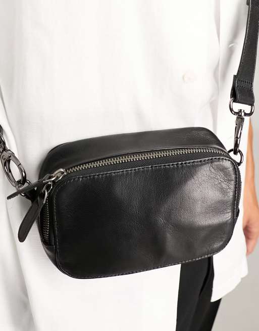 ASOS Design leather messenger cross-body bag with clips in Black