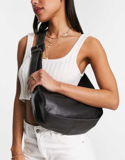 ASOS DESIGN leather curved base crossbody sling bag with contrast stitch in black