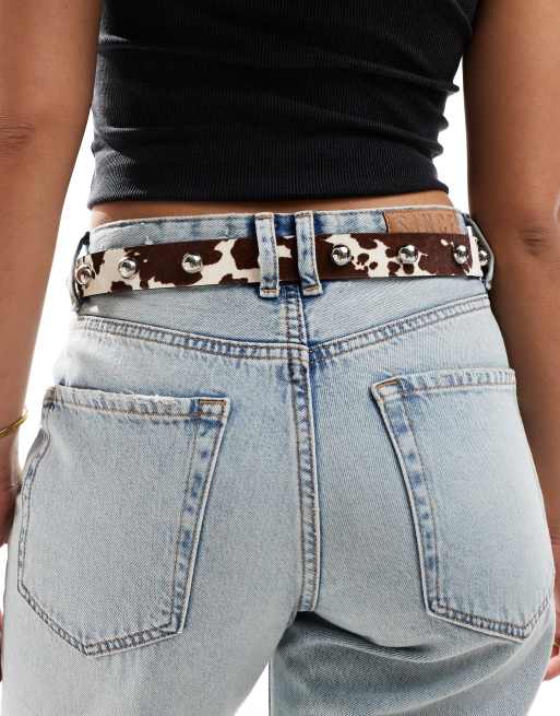 ASOS DESIGN leather double half moon buckle waist and hip belt in cow print