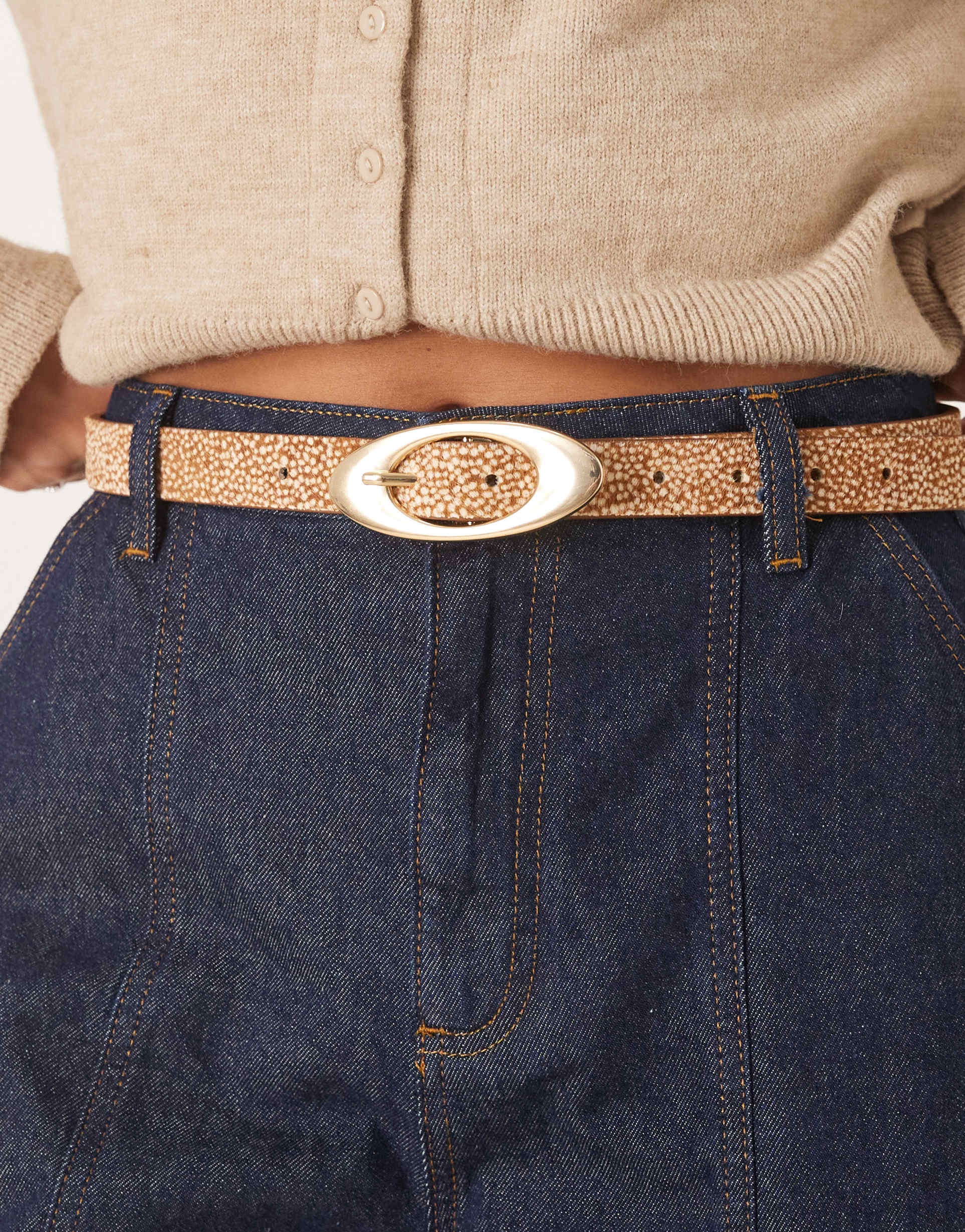 asos design leather faux pony hair waist and hip belt with oval buckle in brown deer print