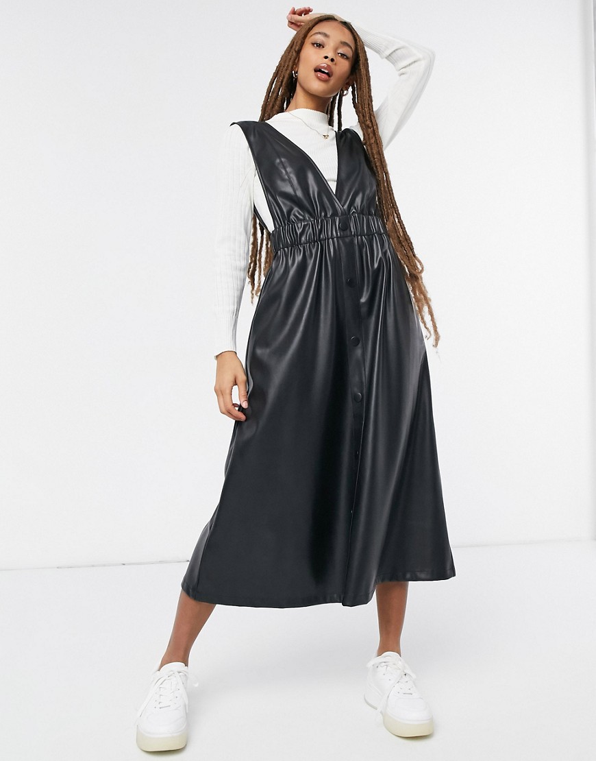 ASOS DESIGN leather look button through apron midi dress in black