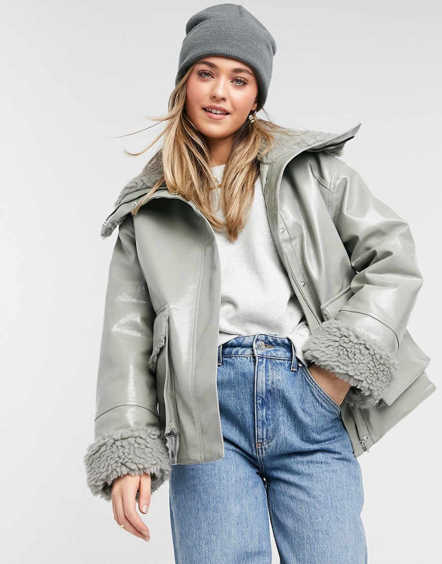 ASOS DESIGN leather look jacket with teddy lining in sage-Multi