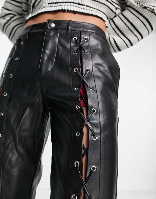 ASOS LUXE leather look skinny pants with lace-up detail in black