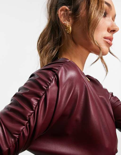 ASOS DESIGN leather look ruched front long sleeve top in burgundy