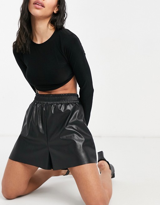 ASOS DESIGN leather look short with shirred waistband in black