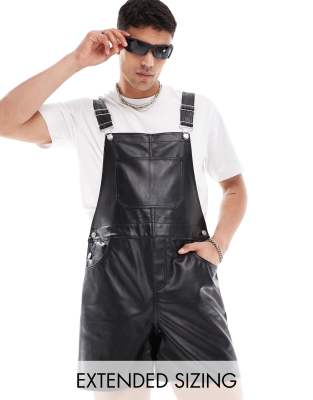 leather look shorter length overalls in black