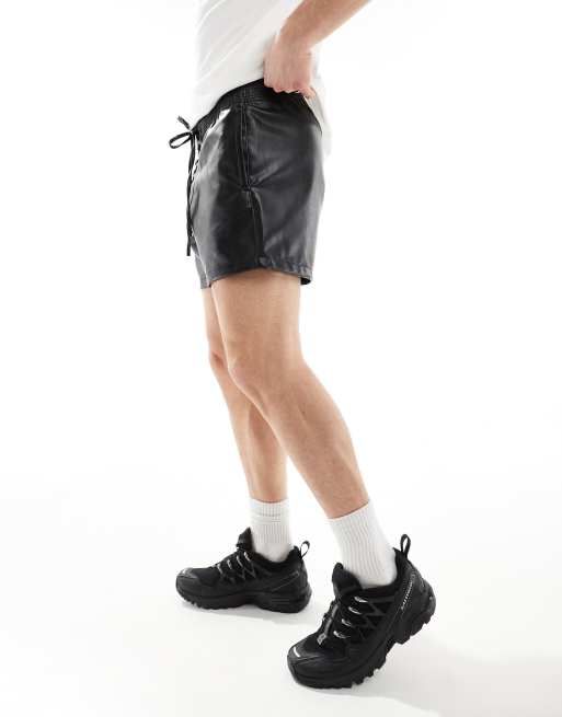 ASOS DESIGN leather look shorts in black with lace up design