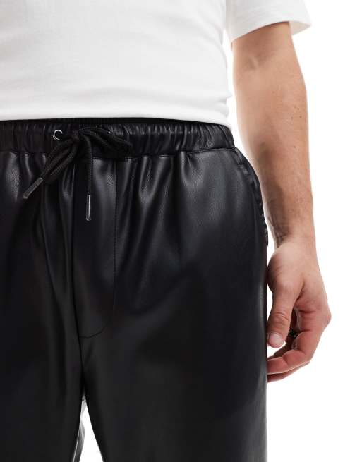 ASOS DESIGN leather look tapered pants in black