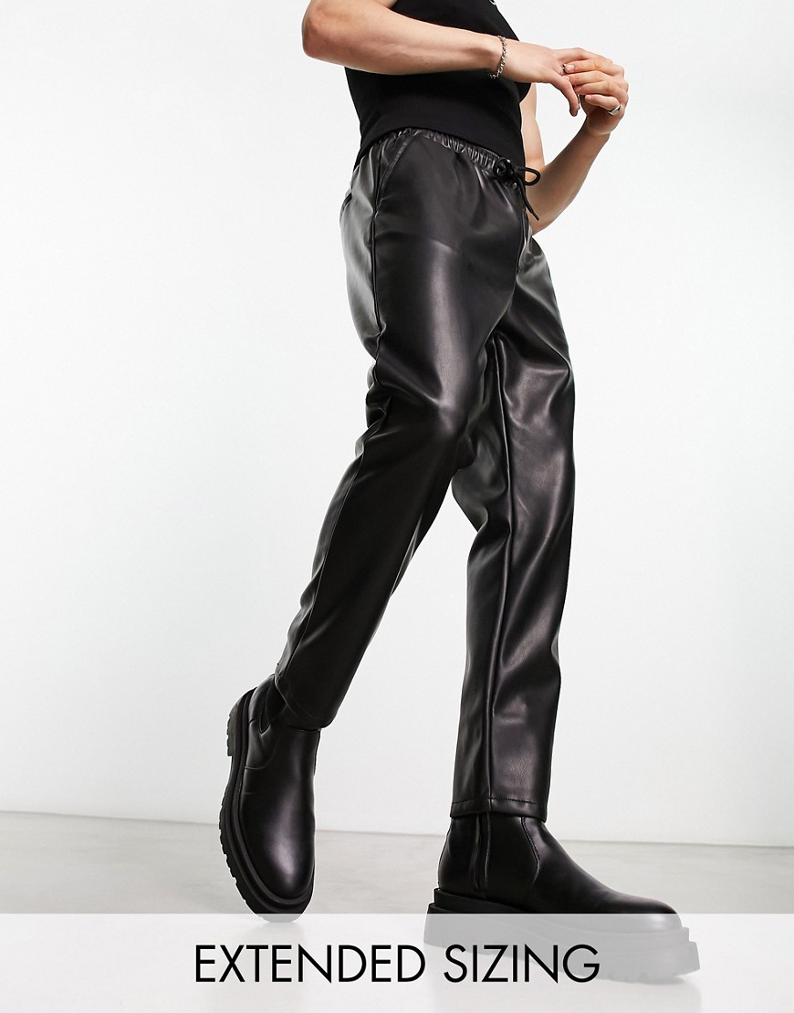 ASOS DESIGN leather look tapered trousers in black
