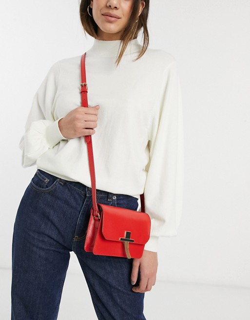 ASOS DESIGN LEATHER cross body bag with tassel clasp