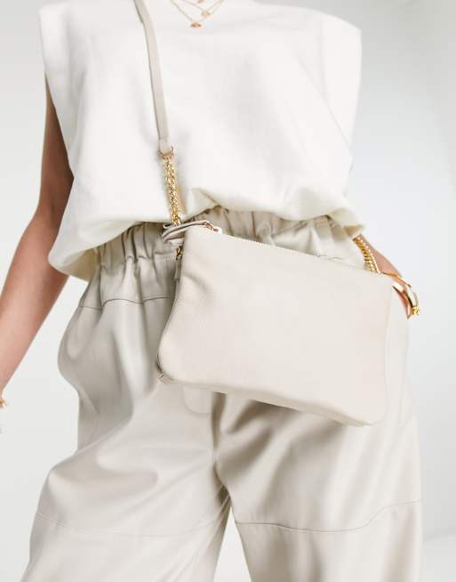 beige leather multi gusset cross body bag with wide strap