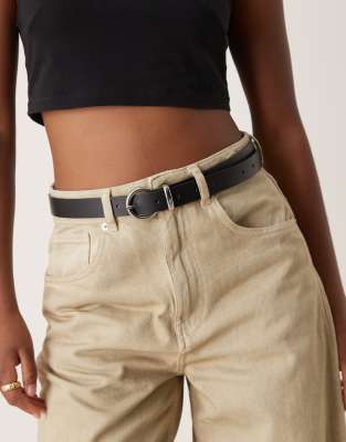 ASOS DESIGN leather skinny waist and hip jeans half moon belt in black - view 1