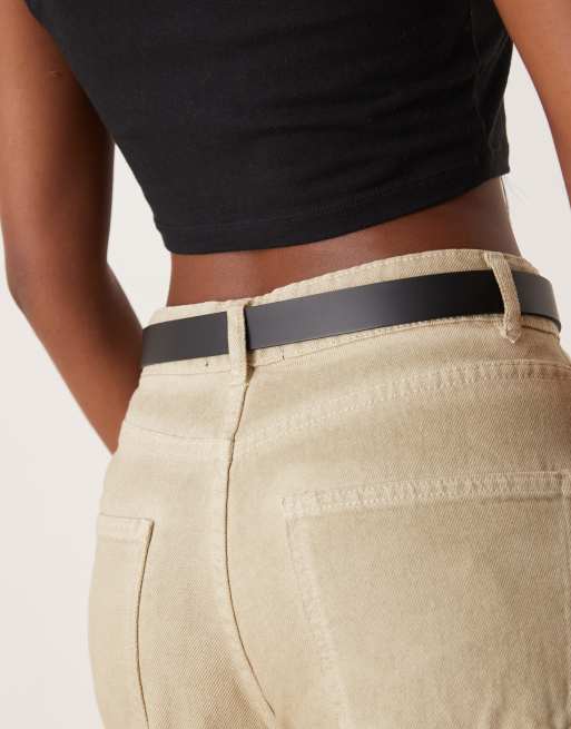 ASOS DESIGN leather skinny waist and hip jeans half moon belt in black