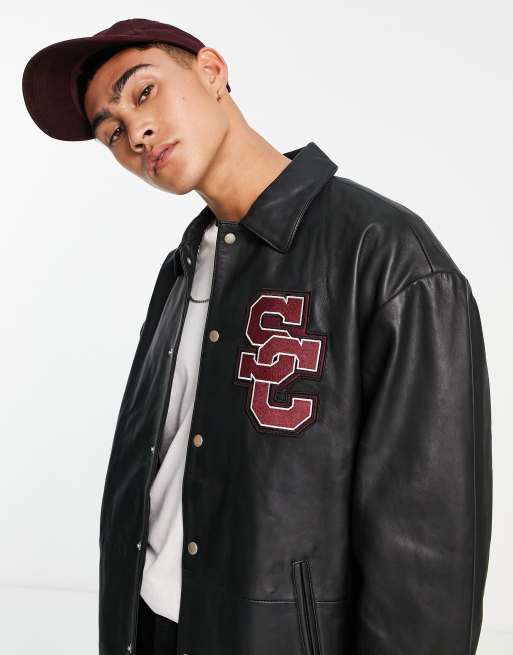 ASOS DESIGN oversized real leather varsity bomber jacket with embroidery in  black