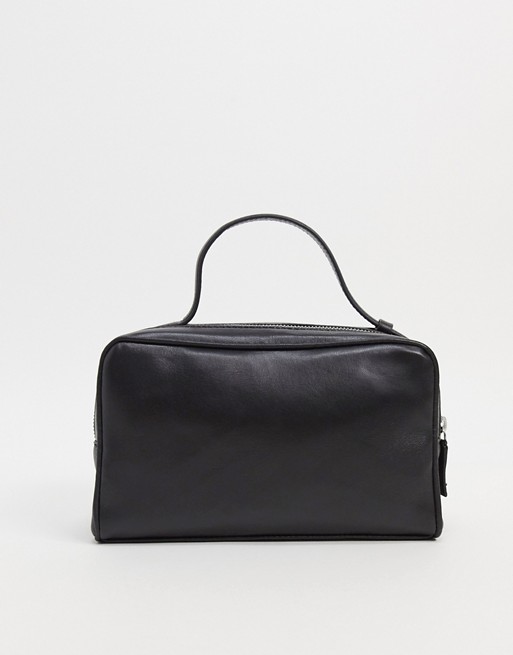 ASOS DESIGN leather washbag in black with strap and double zip