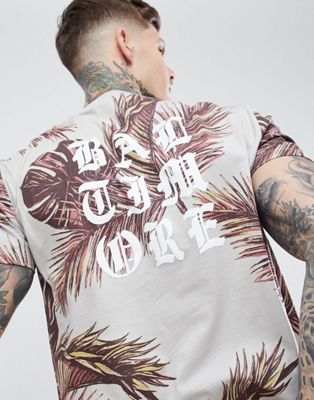 ASOS DESIGN – Ledigt skuren t-shirt med heltäckande blommönster och tryck på ryggen-Grå