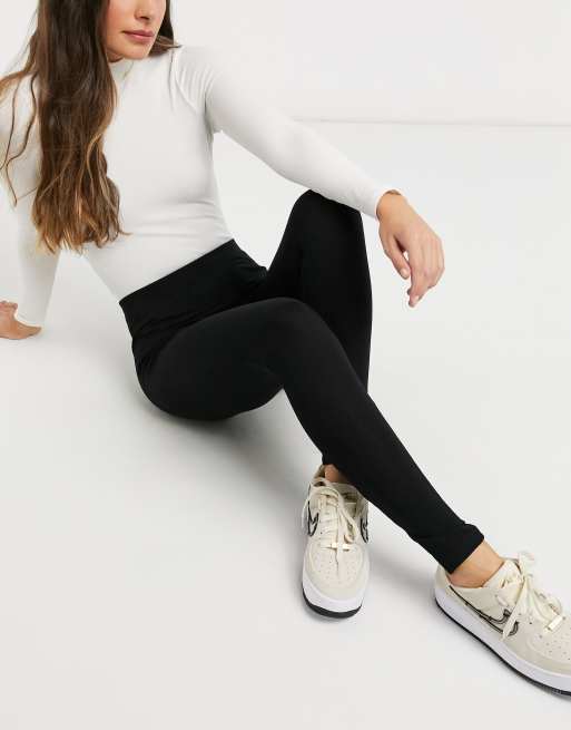 ASOS DESIGN legging with split hem in black