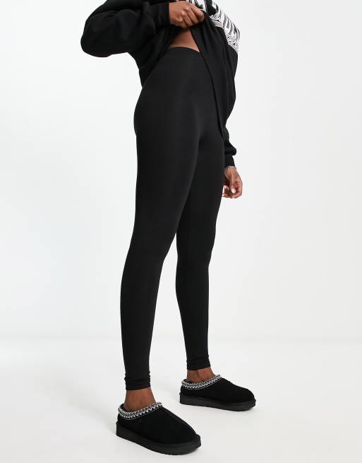 ASOS DESIGN leggings with side split in black