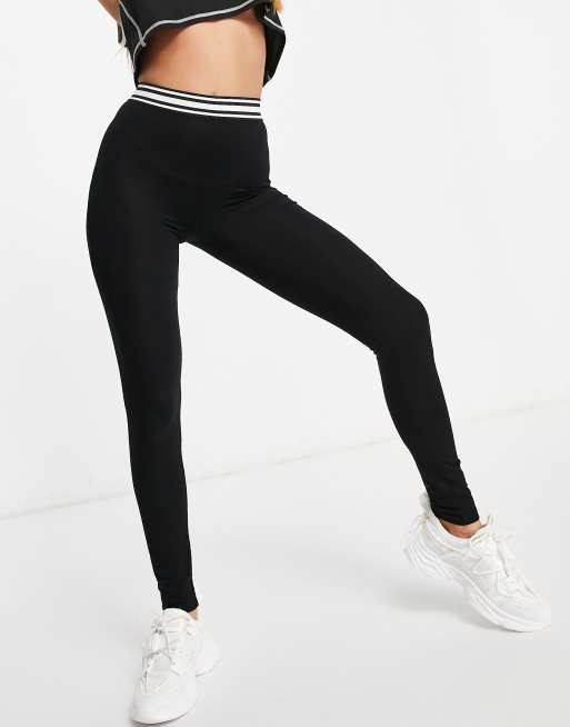 ASOS DESIGN leggings with sporty elastic waistband in black