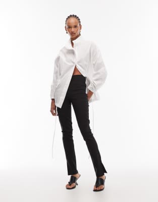 ASOS DESIGN - Leicht verlängerte Bengaline-Leggings in Schwarz mit Seitenschlitz