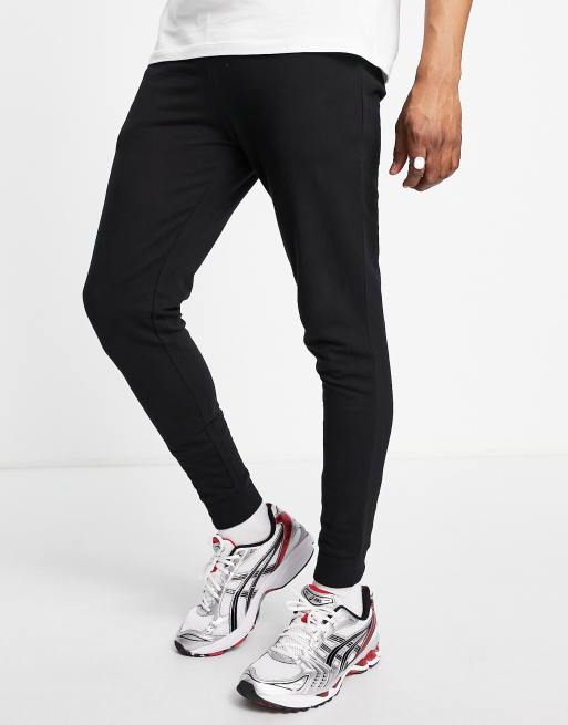 ASOS DESIGN Leichte Jogginghose in Schwarz mit engem Schnitt ASOS